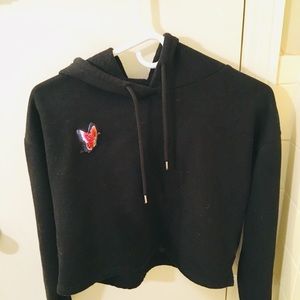 A black cropped jacket